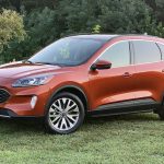 RT_2020-Ford-Escape-Hybrid-Titanium-Sedona-Orange-Front-Quarter