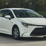 RT_2020-Toyota-Corolla-Hybrid-White-Front-Quarter
