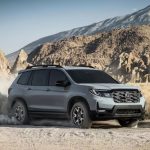 honda-passport-trailsport-2022-04-angle-exterior-front-silver-suv-scaled