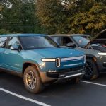 rivian-r1t-01-black-blue-exterior-front-angle-truck-scaled