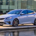 kia-optima-2020-exterior-front-three-quarter-oem