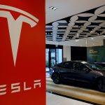 FILE PHOTO: A Tesla model 3 car is seen in their showroom in Singapore